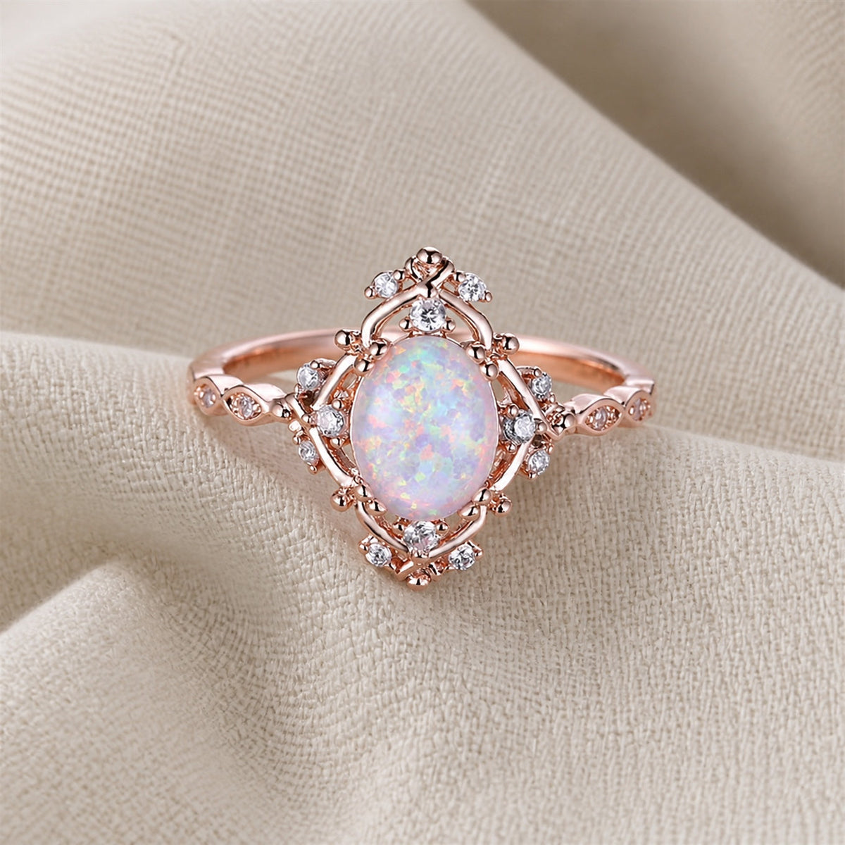 Bague fleur à pierre ovale effet opale