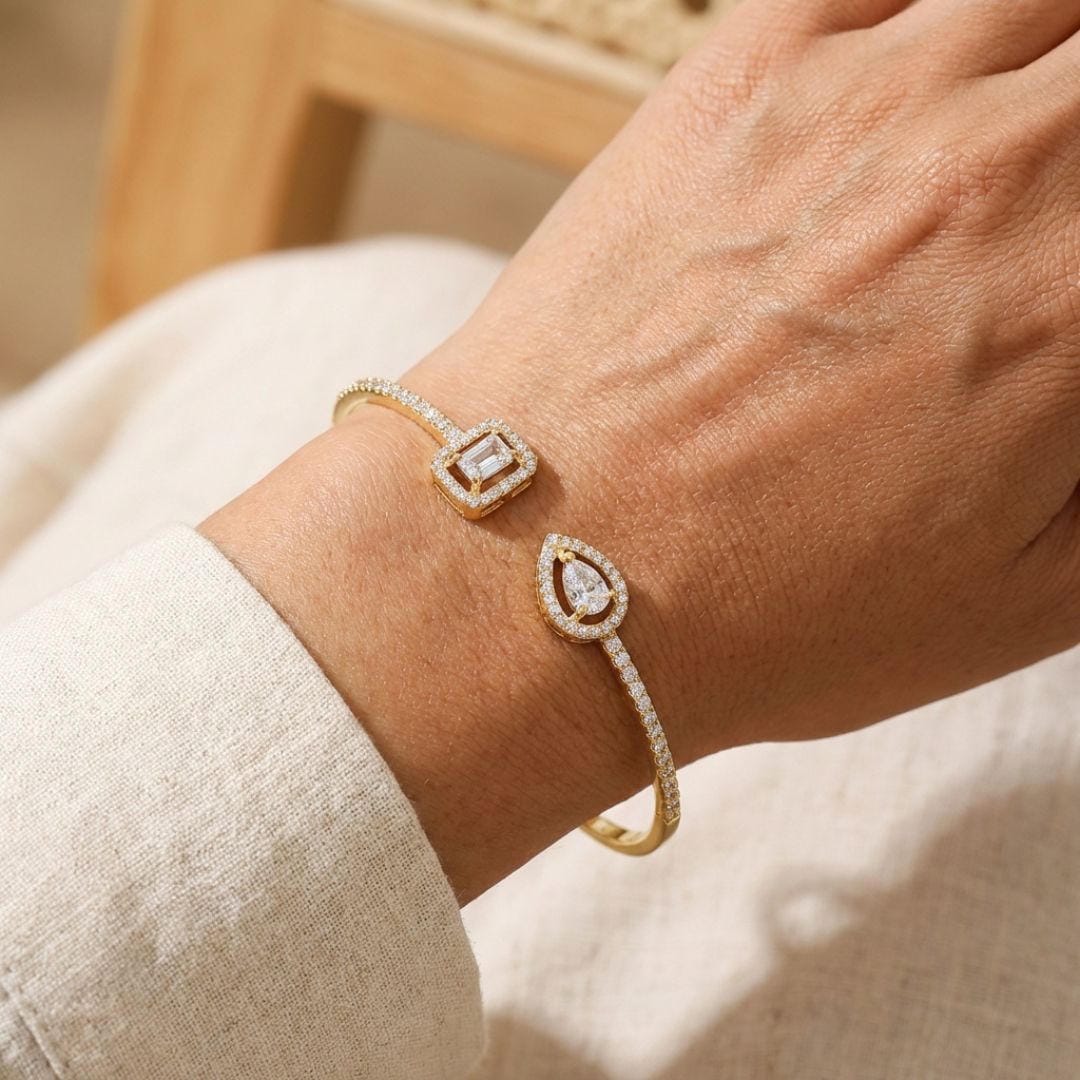 Bracelet jonc ouvert doré à deux pierres