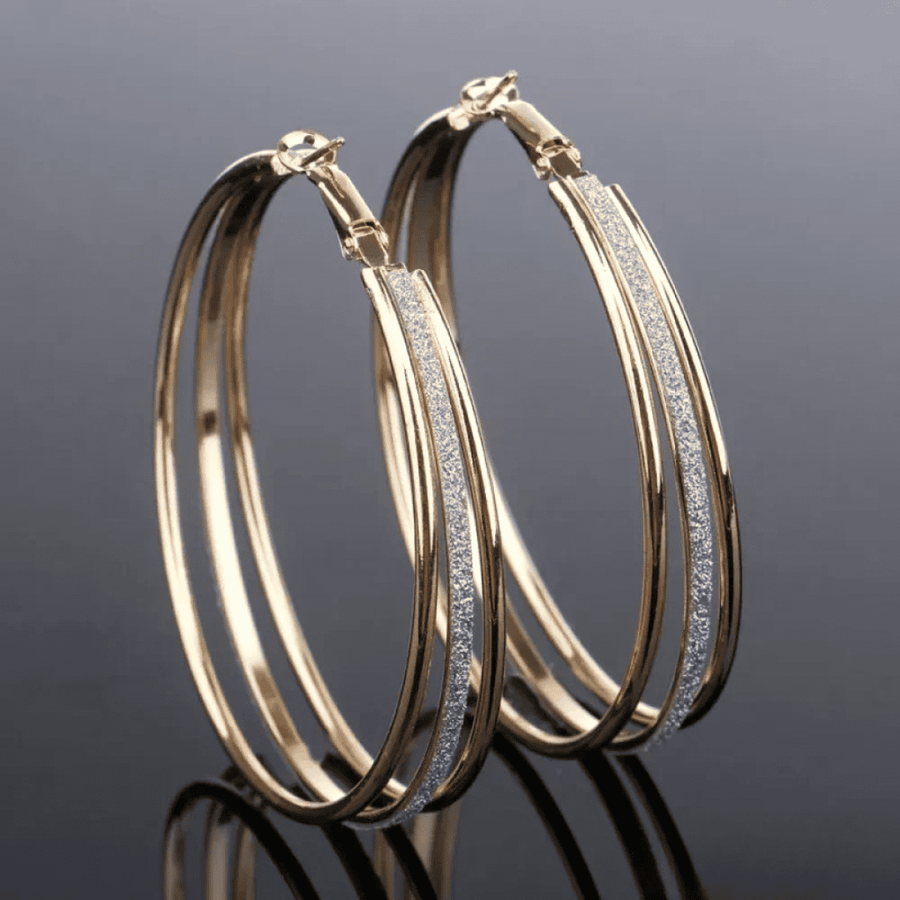 Boucles d'oreilles anneaux dorées rétro