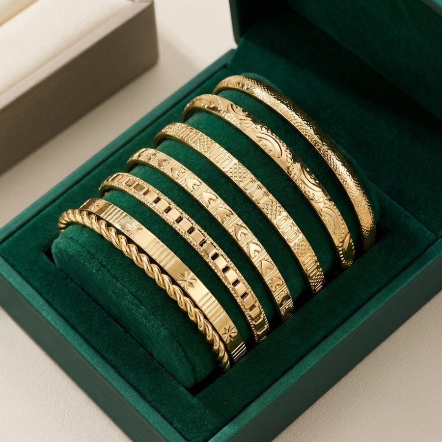Ensemble de bracelets joncs ouverts dorés Resort