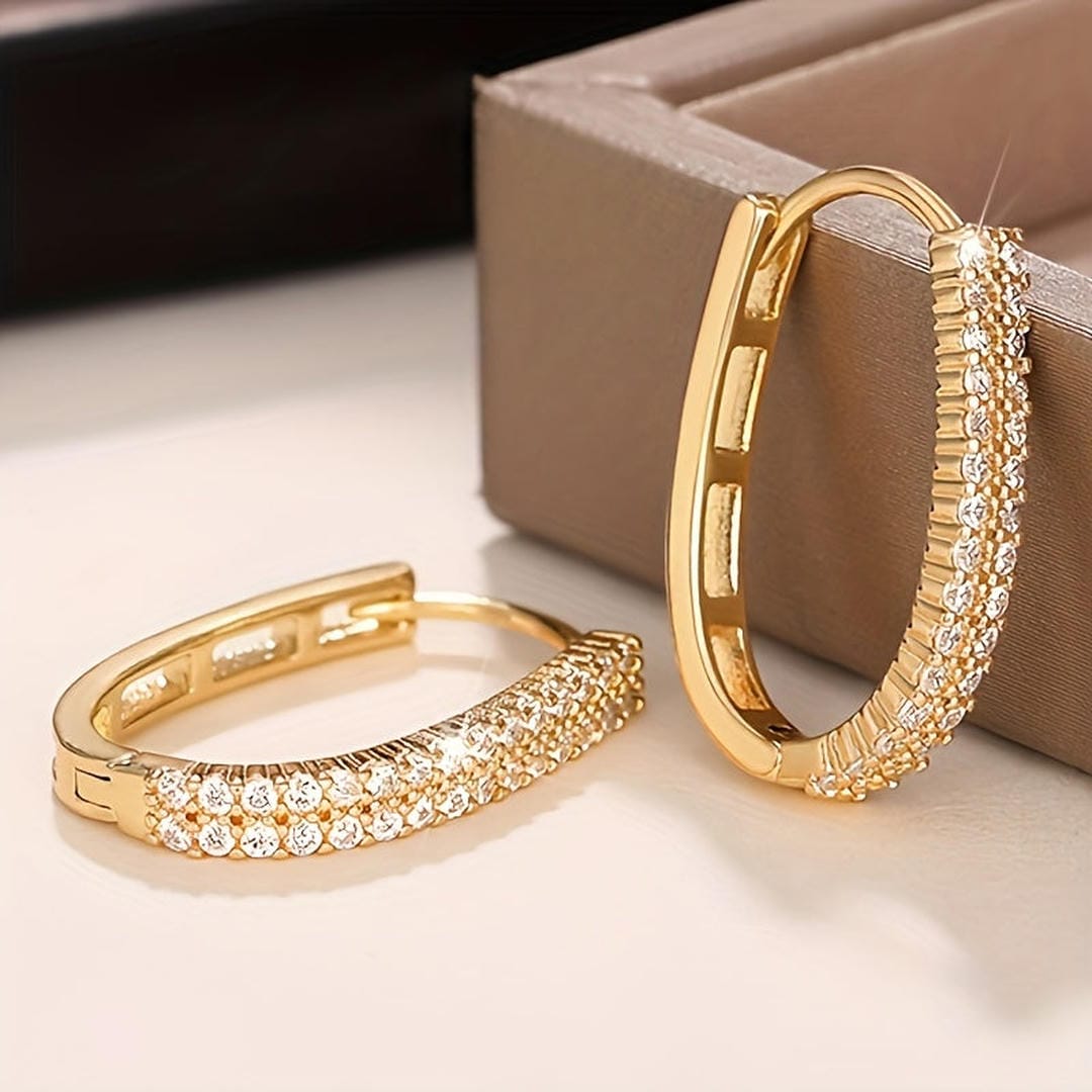 Boucles d'oreilles circulaires élégantes à zircons