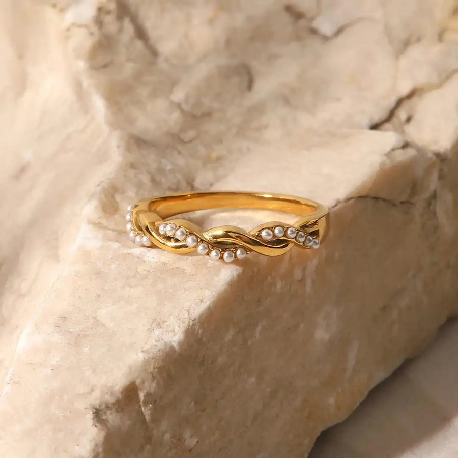 Bague fine tressée avec perle
