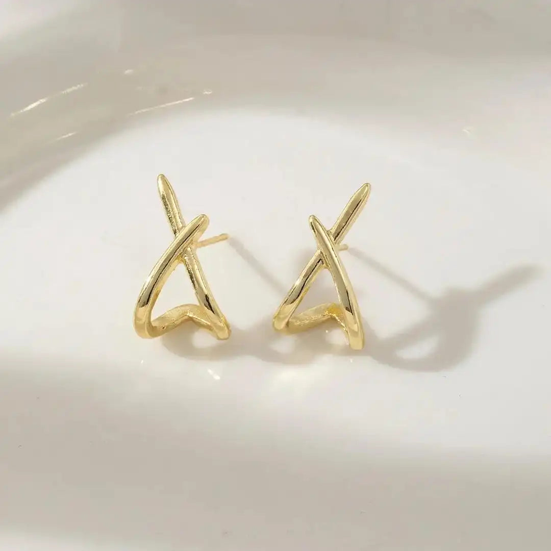 Boucles d'oreilles Croix dorées intemporelles