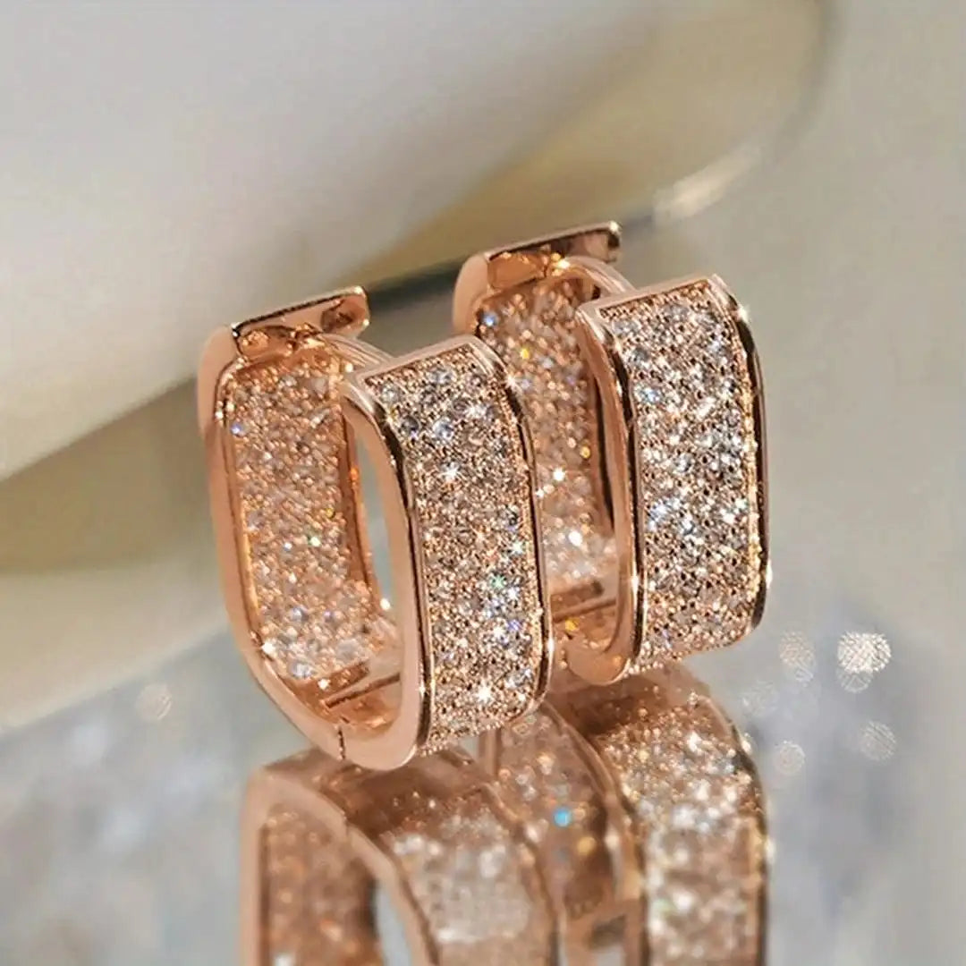 Boucles d'oreilles anneaux Huggie Pavelina