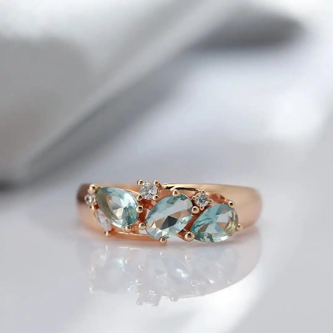 Bague Or rose vintage à zircon bleu