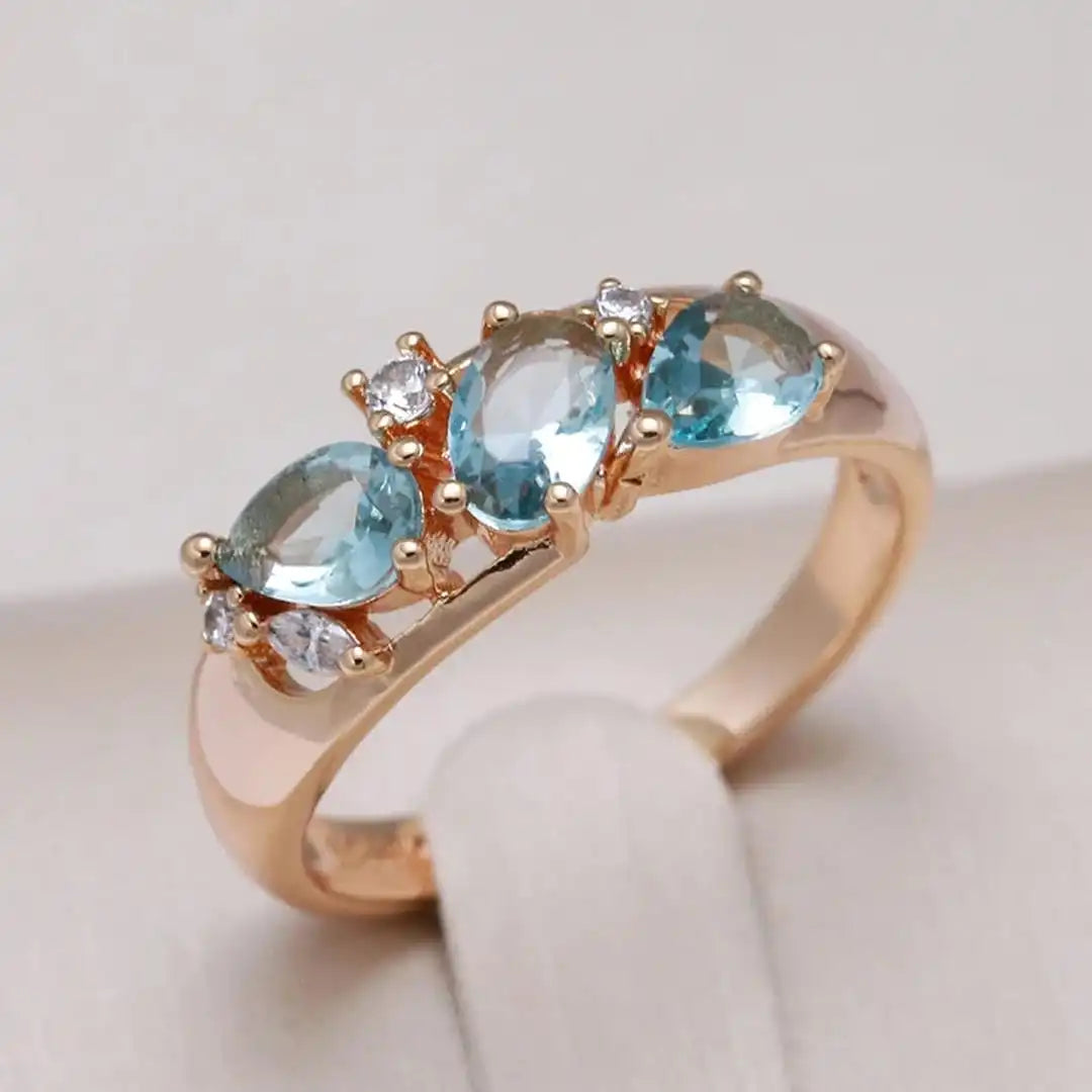 Bague Or rose vintage à zircon bleu