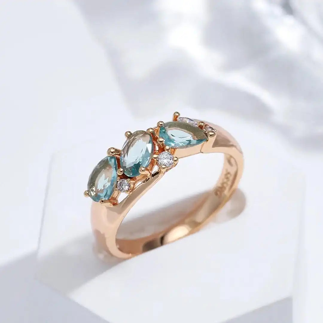 Bague Or rose vintage à zircon bleu