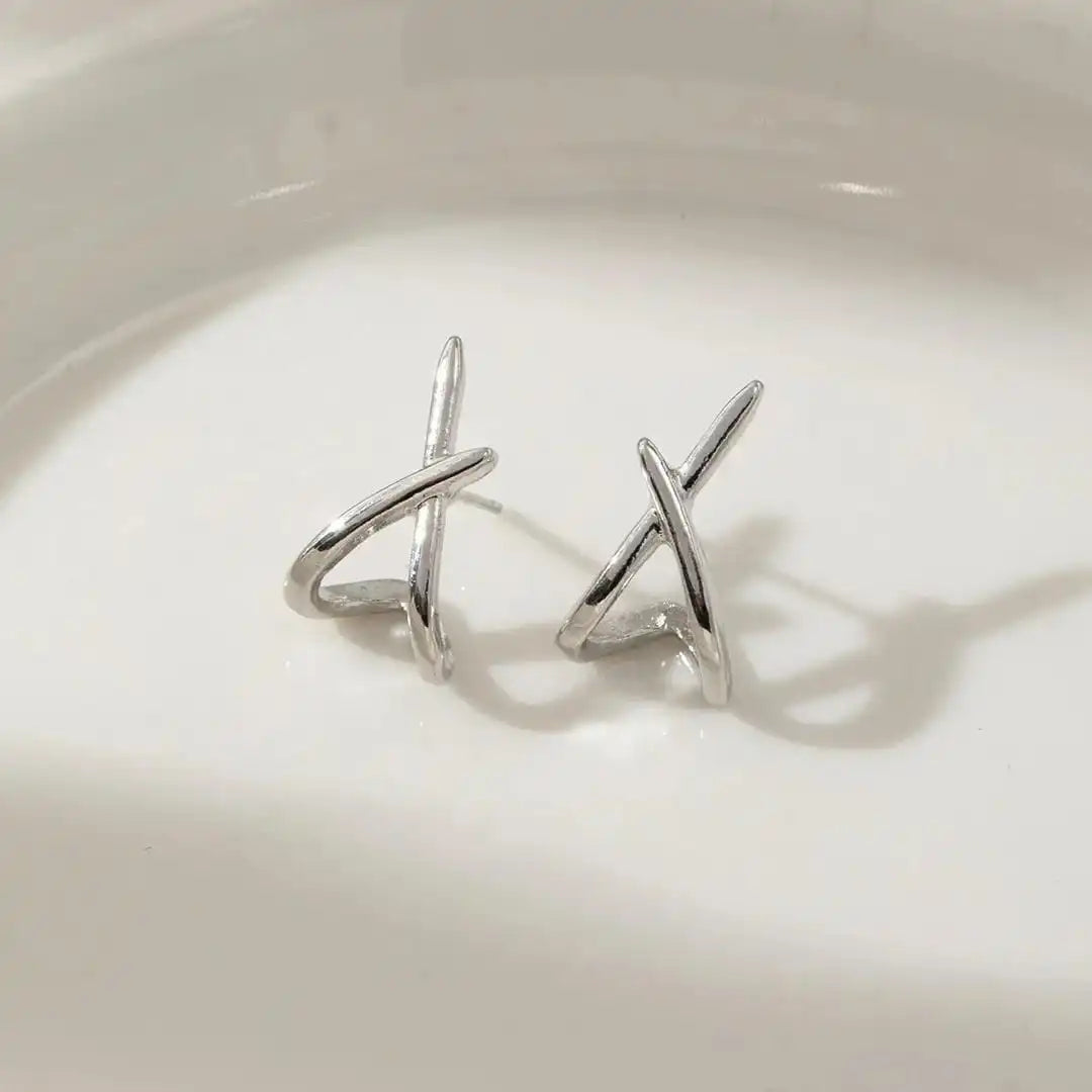 Boucles d'oreilles Croix dorées intemporelles