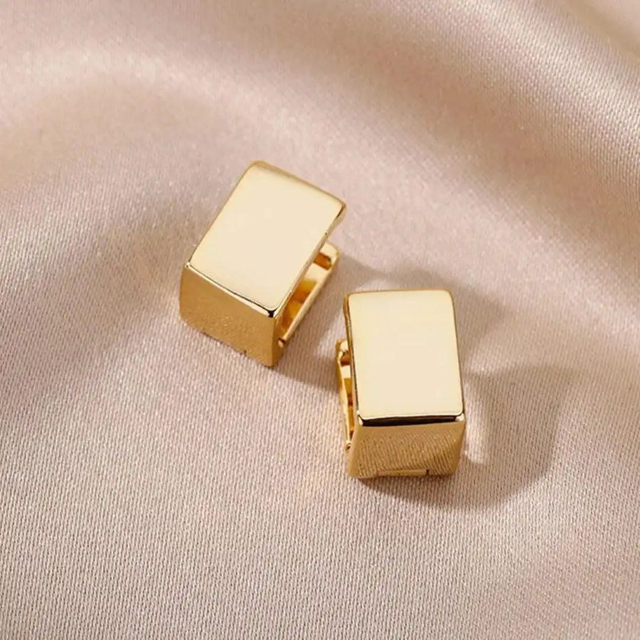 Boucles d'oreilles Carrés géométriques dorés