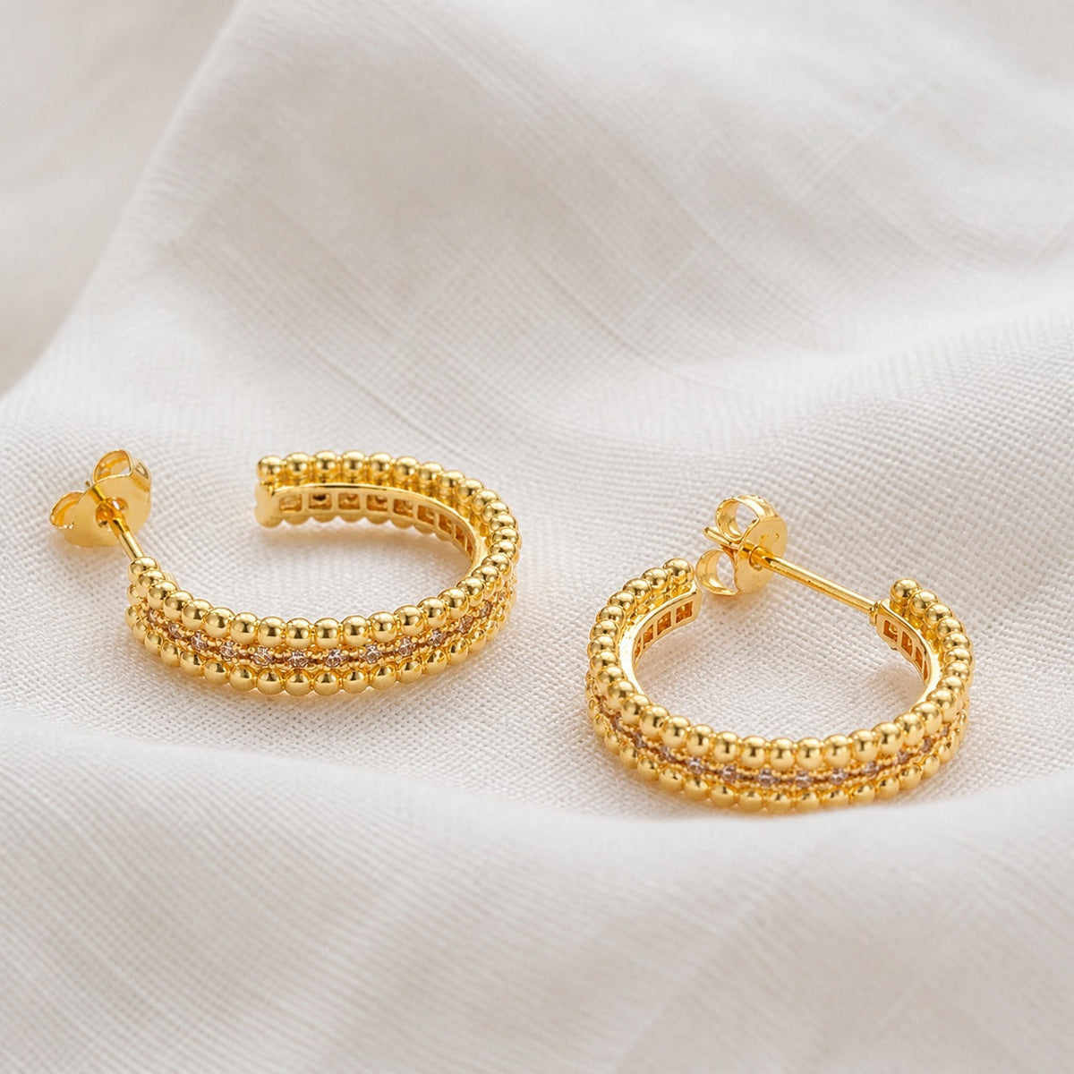 Boucles d'oreilles anneaux Cristal cloutées