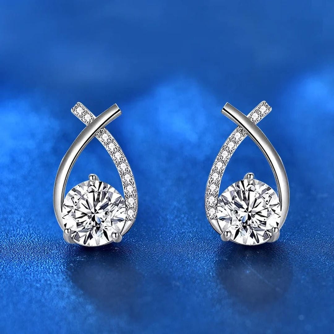 Boucles d'oreilles à tige goutte entrelacée à zircons
