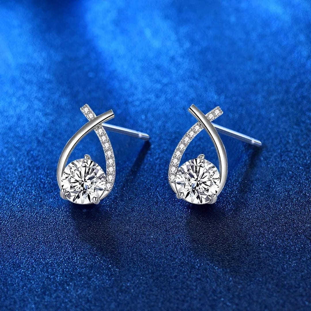 Boucles d'oreilles à tige goutte entrelacée à zircons